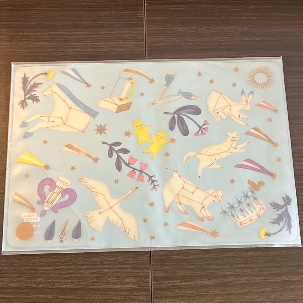 Hobonichi A6 cover on cover (Light in the Distance by Yuka Hiiragi)